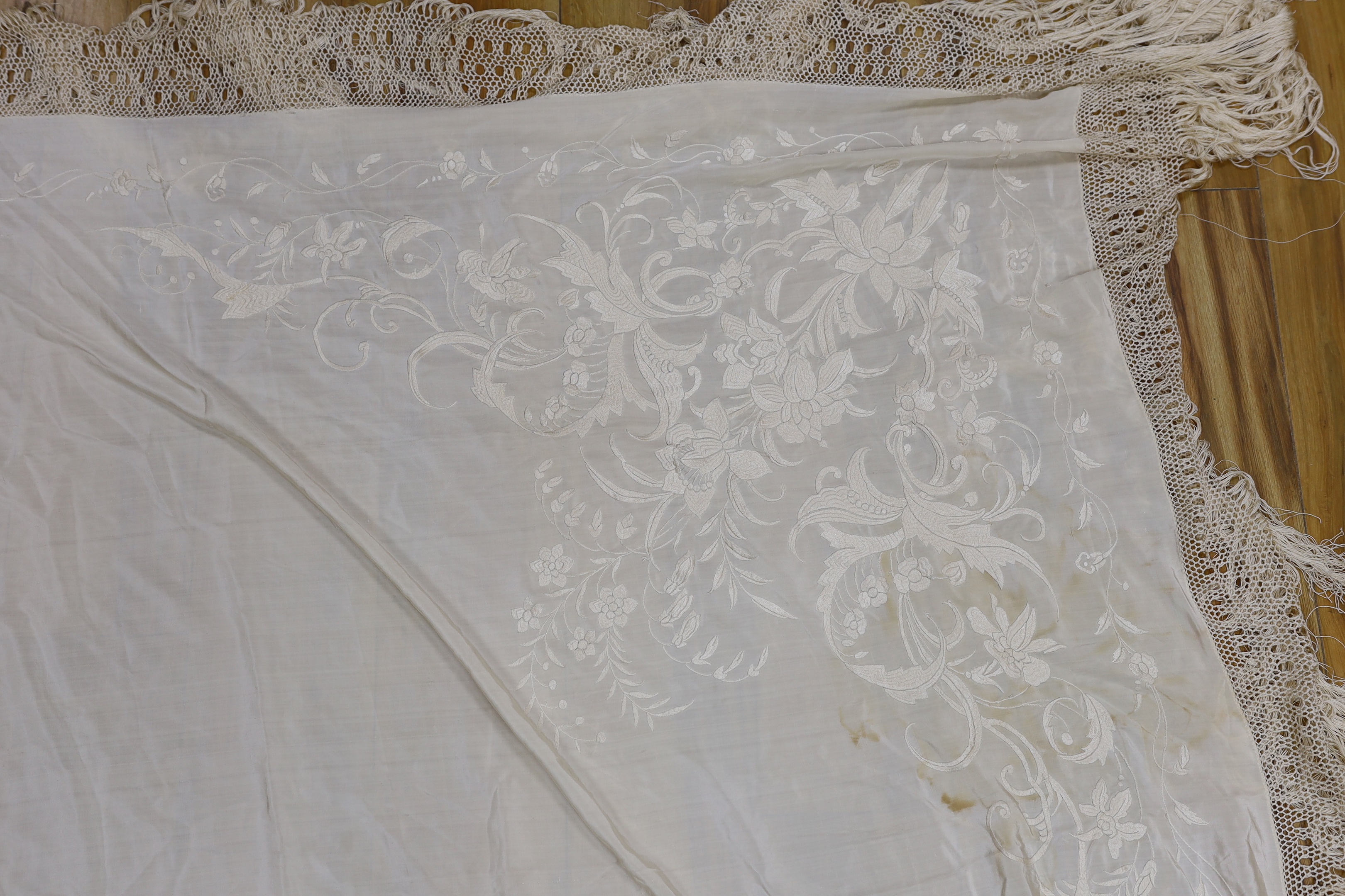 Two silk cream on cream Chinese embroidered shawls